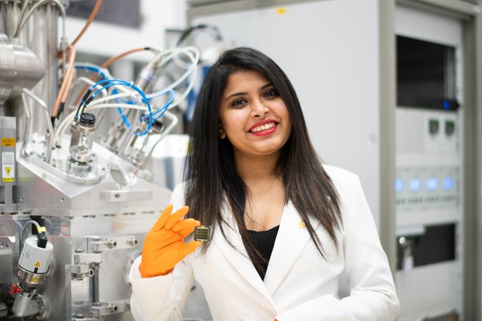 Dr Hashini Perera with the perovskite solar cell