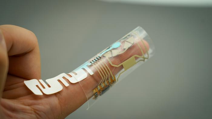 Sweat-powered finger wrap sensors