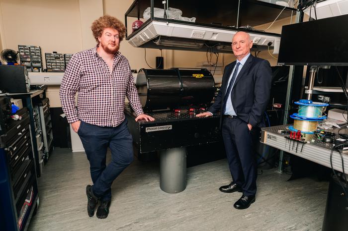 The academic team featuring Dr Ross Donaldson and Professor Gerald Buller with equipment from the new optical ground station at Heriot-Watt University