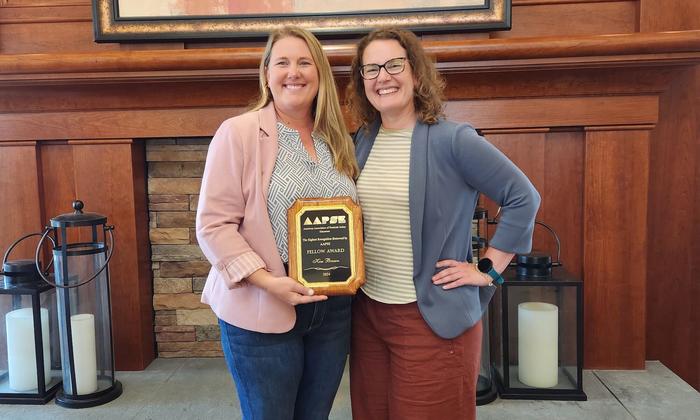 Kim Brown (left), University of Tennessee Extension specialist with the UT Department of Plant Sciences, named a Fellow by the American Association of Pesticide Safety Educators (AAPSE).