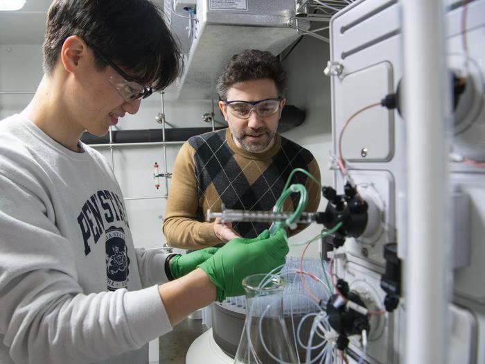 two researchers in a chemistry lab