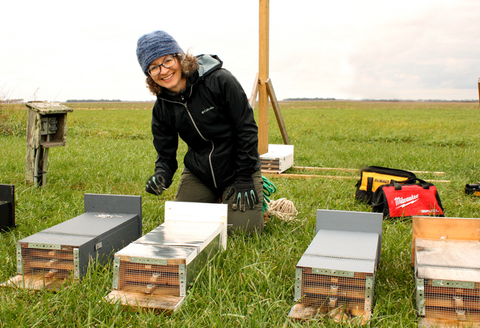 Joy O'Keefe with bat boxes