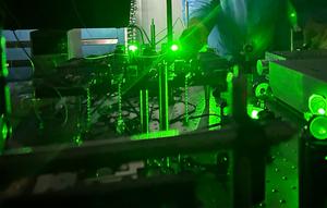 Green laser light is used to manipulate the energy states of barium ions