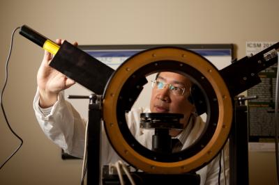 Gobet Advincula Adjusts Plasmon Spectrometer