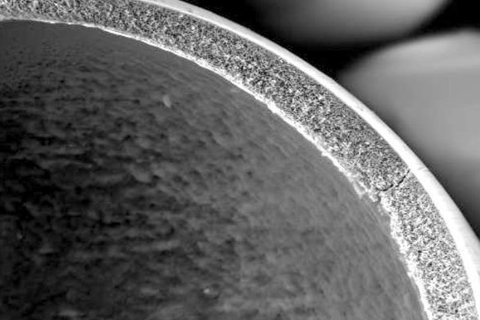 Cross-section of the microsphere's porous wall.