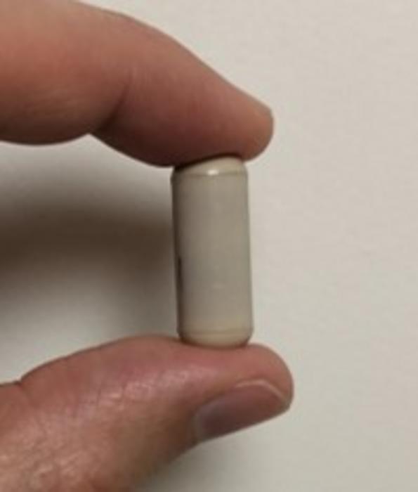 VMPill is a vitamin capsule sized ingestible physiological monitoring device with a sealed biocompatible plastic shell