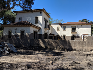 Mud line on houses after 2018 mudslides