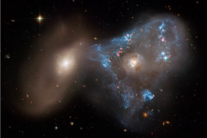 Galaxy Collision Creates 'Space Triangle' in New Hubble Image