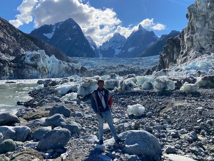 Dr. Georg Veh in front of Lake No Lake in British Columbia (Canada), this lake is dammed by the Tulsequah glacier in the background and empties several times a year.