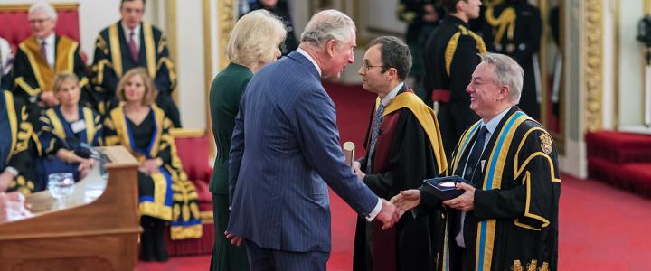 Receiving the award from HRH the Prince of Wales and the Duchess of Cornwall