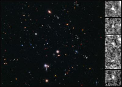 Hubble Spies Building Blocks of Most Distant Galaxy Cluster