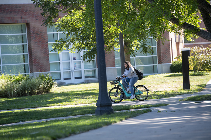 A student riding a bicycle