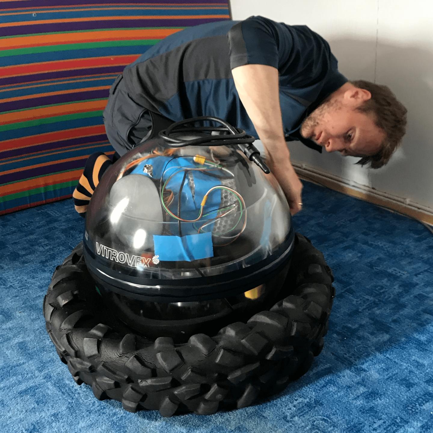 Evgeny A. Podolskiy assembling the ocean-bottom seismometer