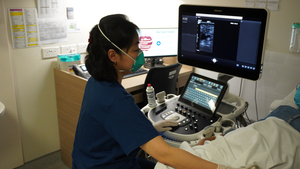 CGH radiographer carries out an ultrasound scan of a patient's blood vessel
