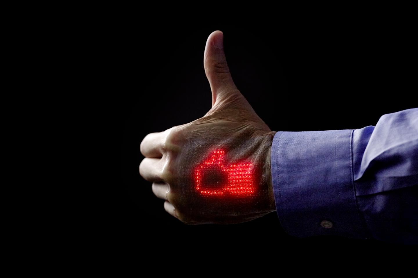 Thumbs-up Icon On Skin Display