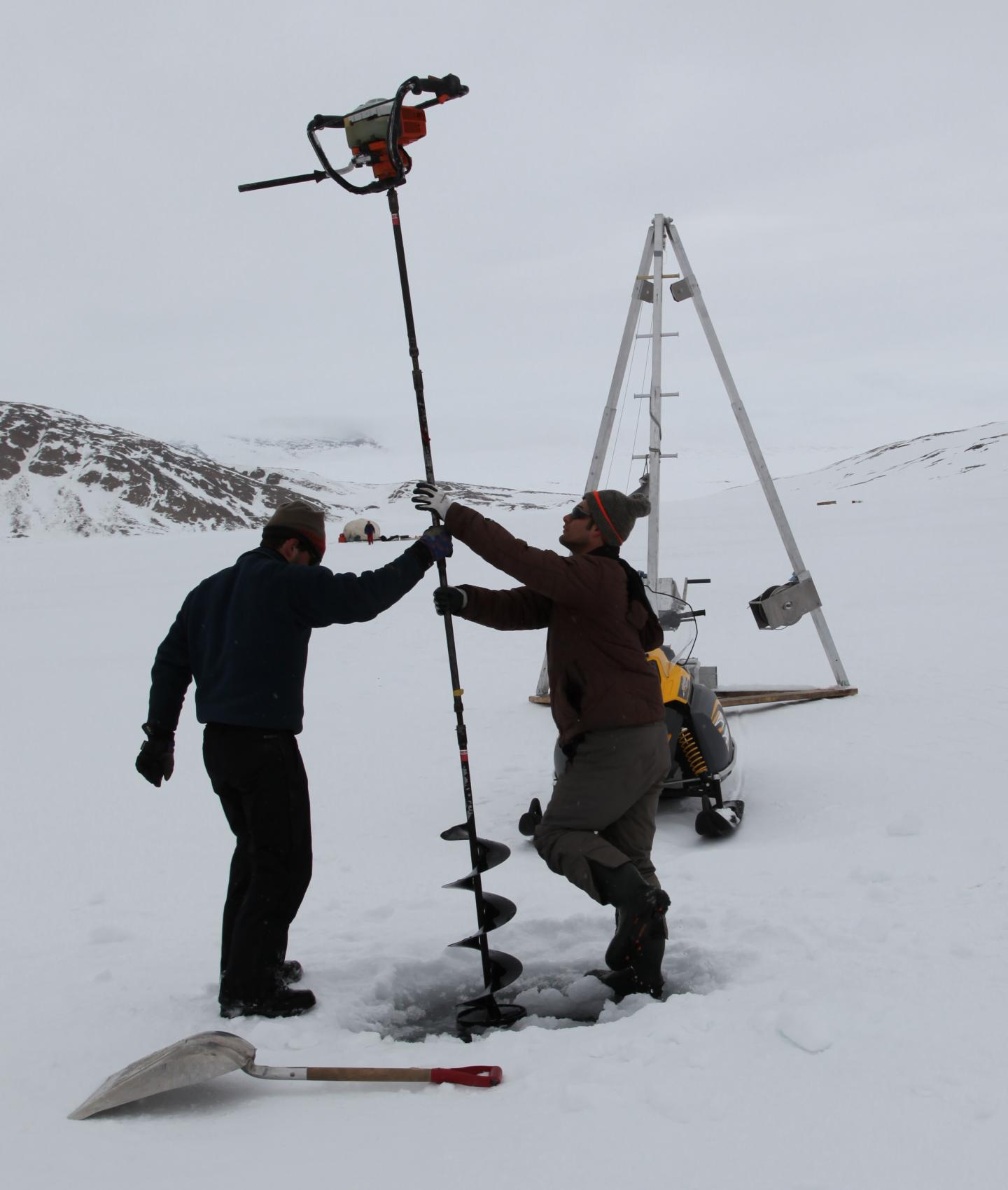 Using an Ice Augur in the Canadian Arctic