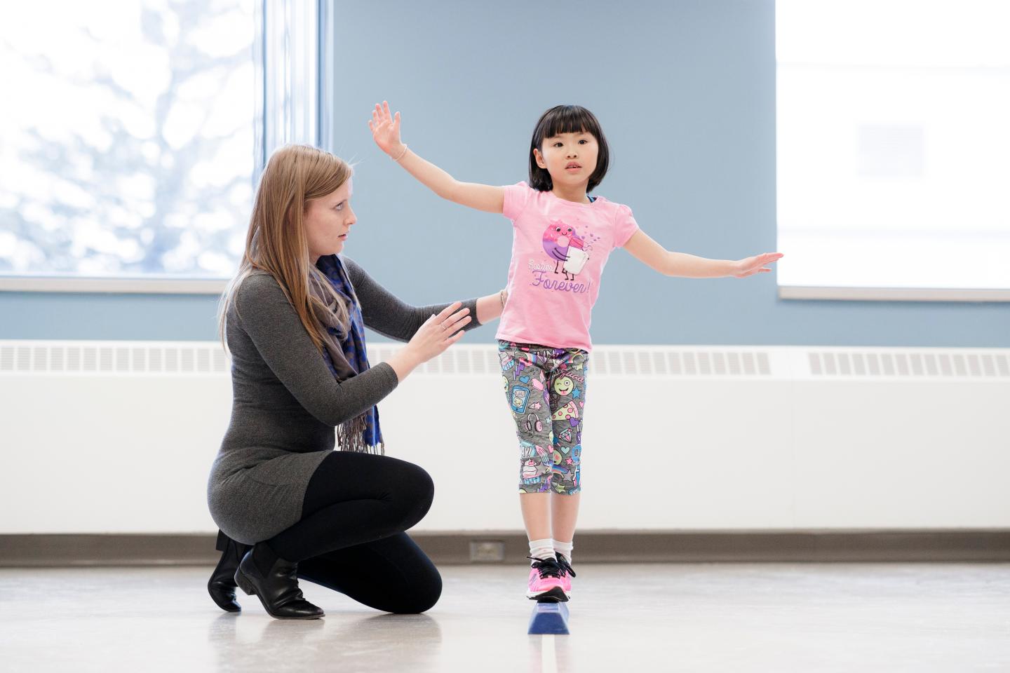 Research Coordinator Sarah Randall (Occupational Therapy) Assesses a Child