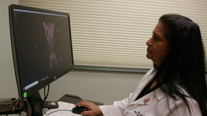 Dr. Shah Reviewing Mammogram Scans
