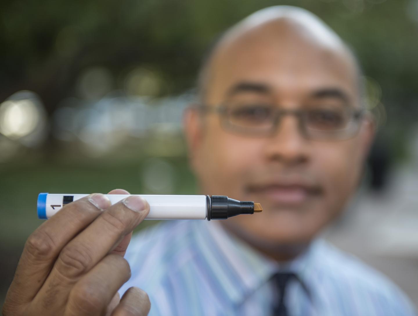 Jayant Pinot, MD, with Research Tool