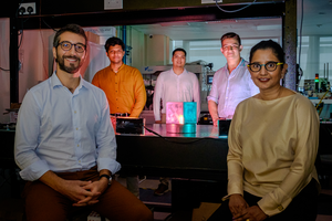 The joint team that designed and produced the Structure and Reflectance cube, which was 3D-printed at NTU Singapore