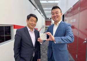 Honorary Professor Mike Xie and Dr Jiaming Ma hold a 3D-printed model of the team's double lattice design.