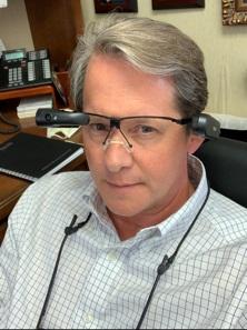 R. Brent Wright, M.D., wearing smart glasses