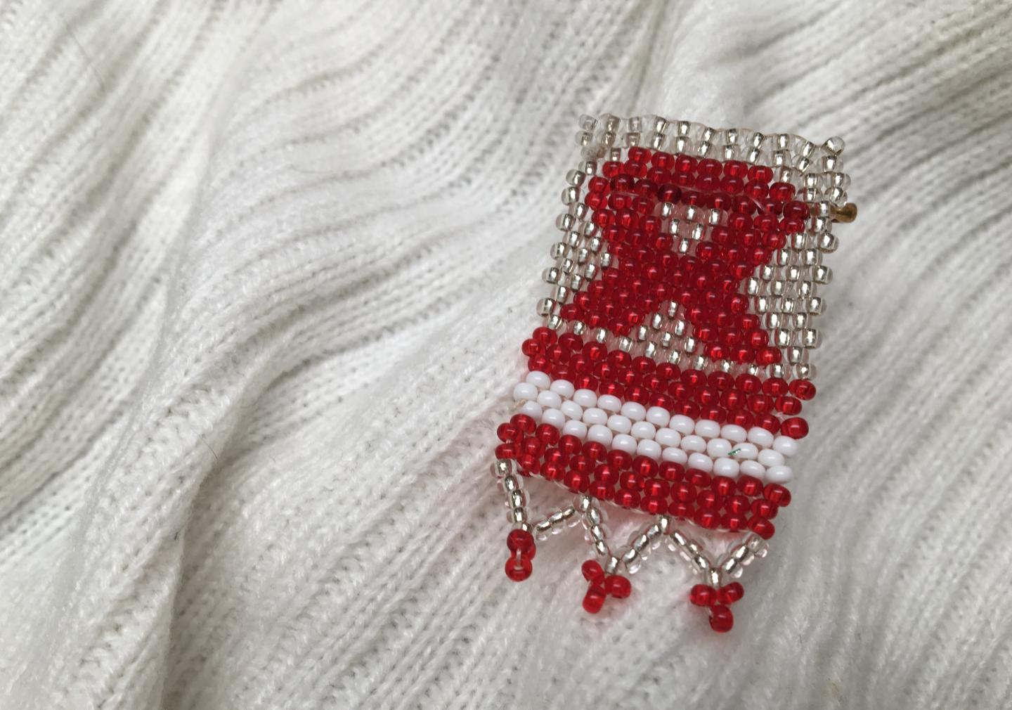 Beaded AIDS Awareness pin.