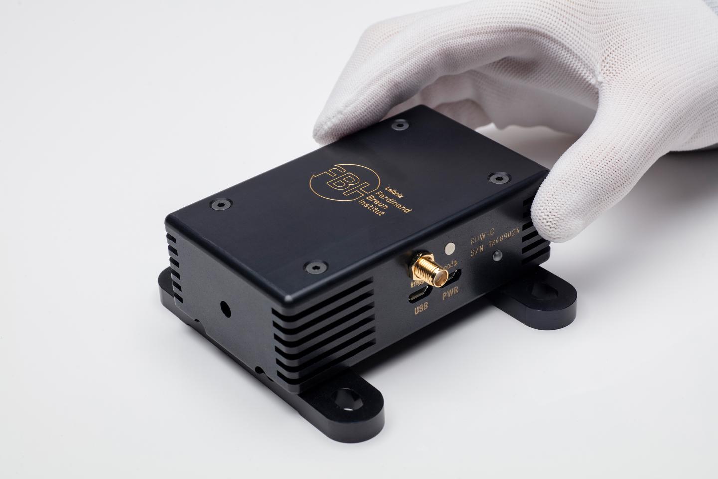 Compact Dual-Wavelength Turnkey Laser System for Shifted Excitation Raman Difference Spectroscopy