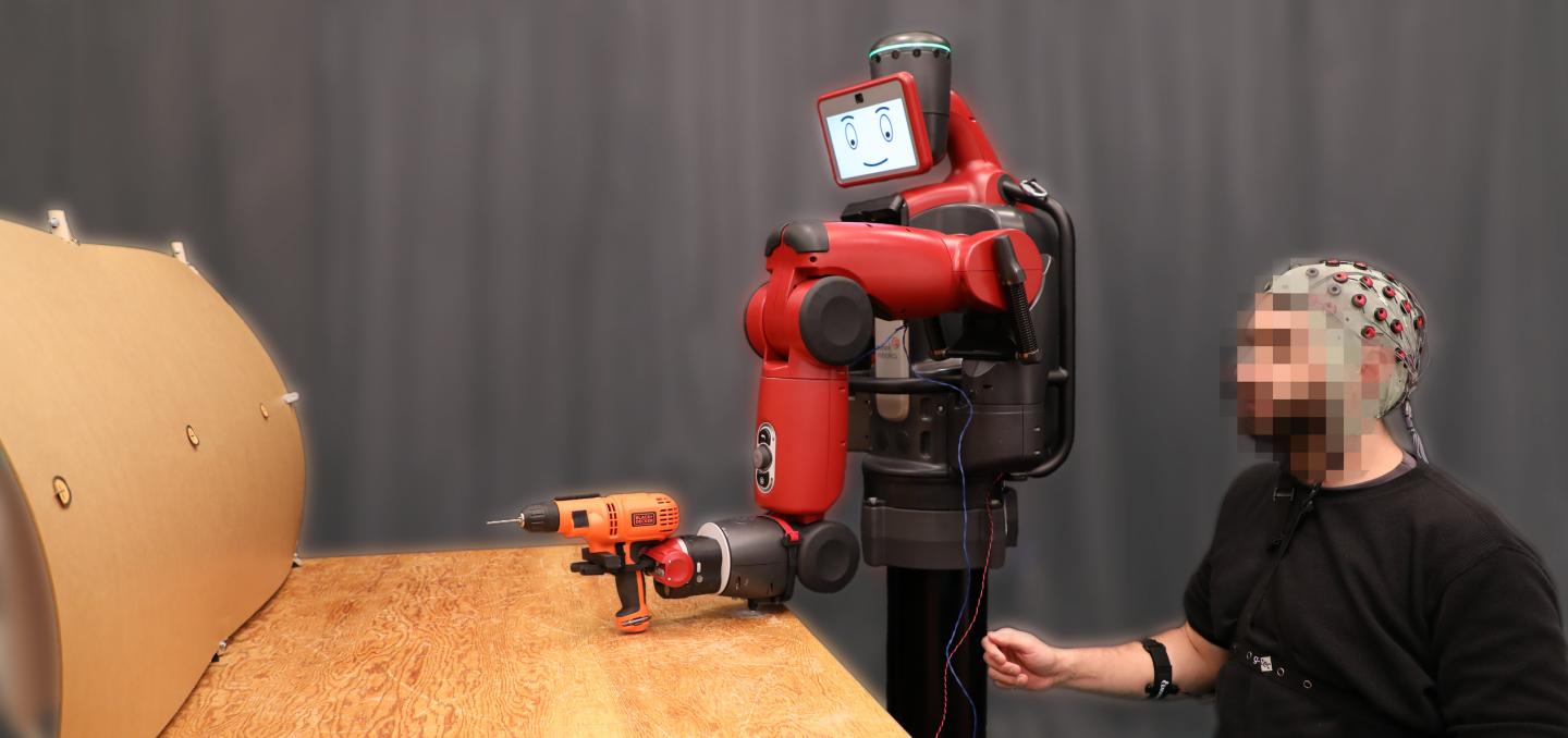 A User Demonstrates Using Gestures to Guide the Robot