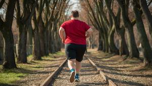 adult with obesity practicing running