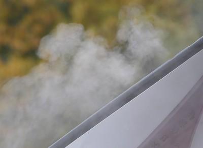 Recoil of Evaporating Molecules Changes Pressure at Surface of Liquid