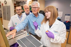 Kameron Kooshesh, David Sykes, David Scadden, and Karin Gustafsson at work in their lab at MGH.