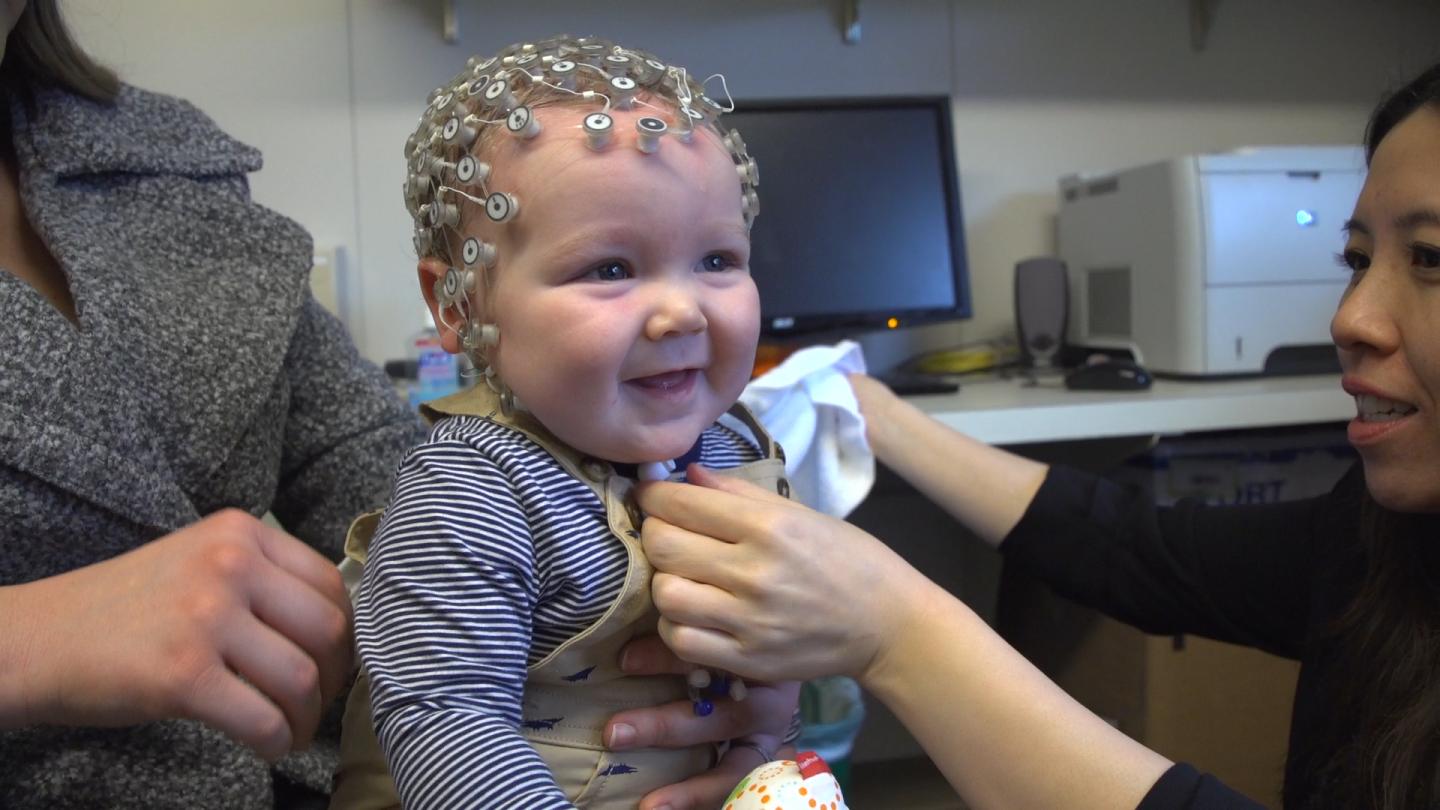 Infant is prepared for brain scan
