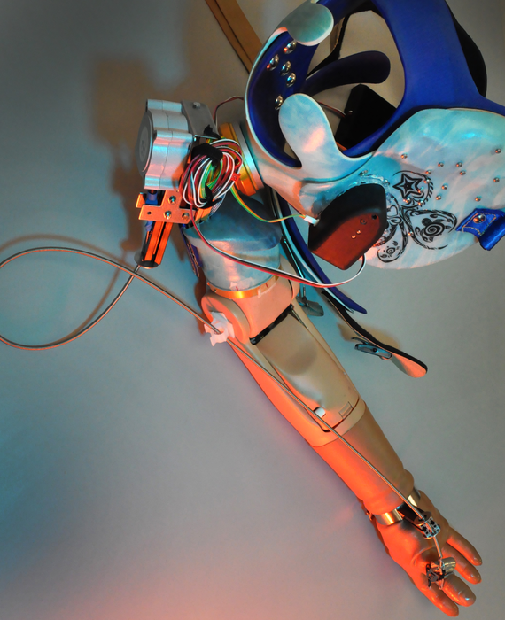 Bionic prosthetic arm with grip movement sensation and touch