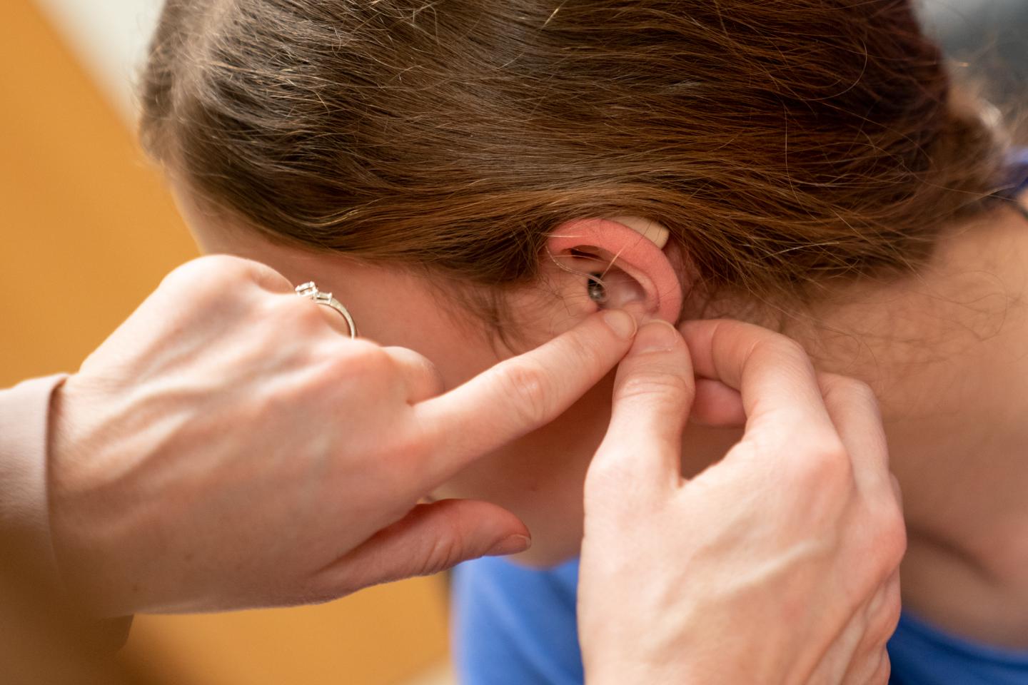 Child Getting Fitted for Hearing Device