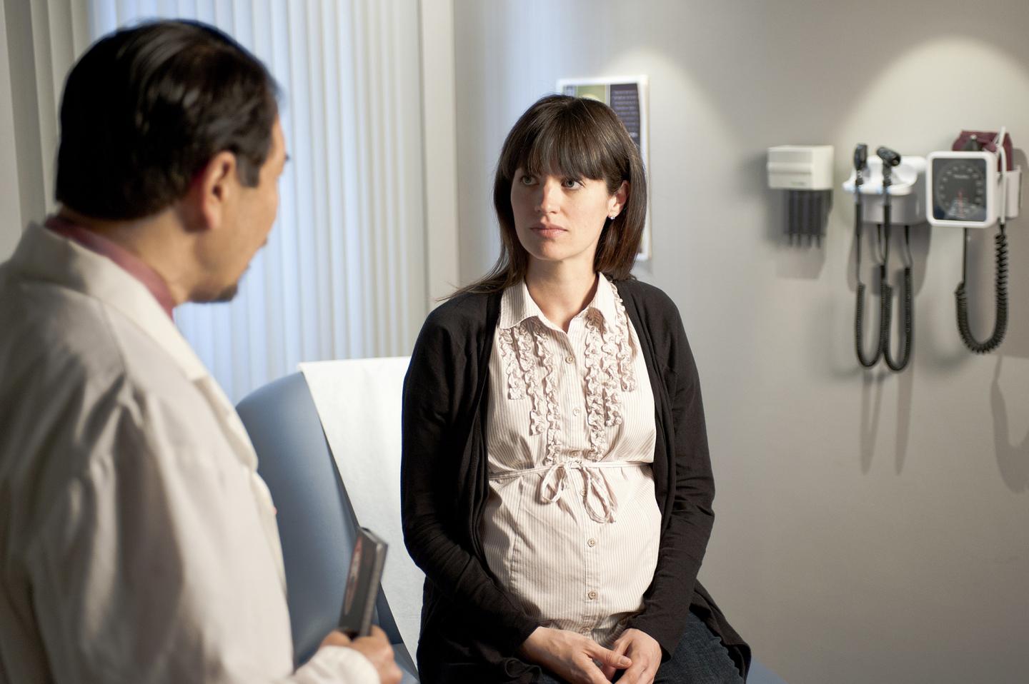 A Pregnant Woman with a Doctor