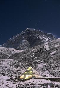 The Pyramid Observatory at night. Pumori Peak (Nepal) in the background.