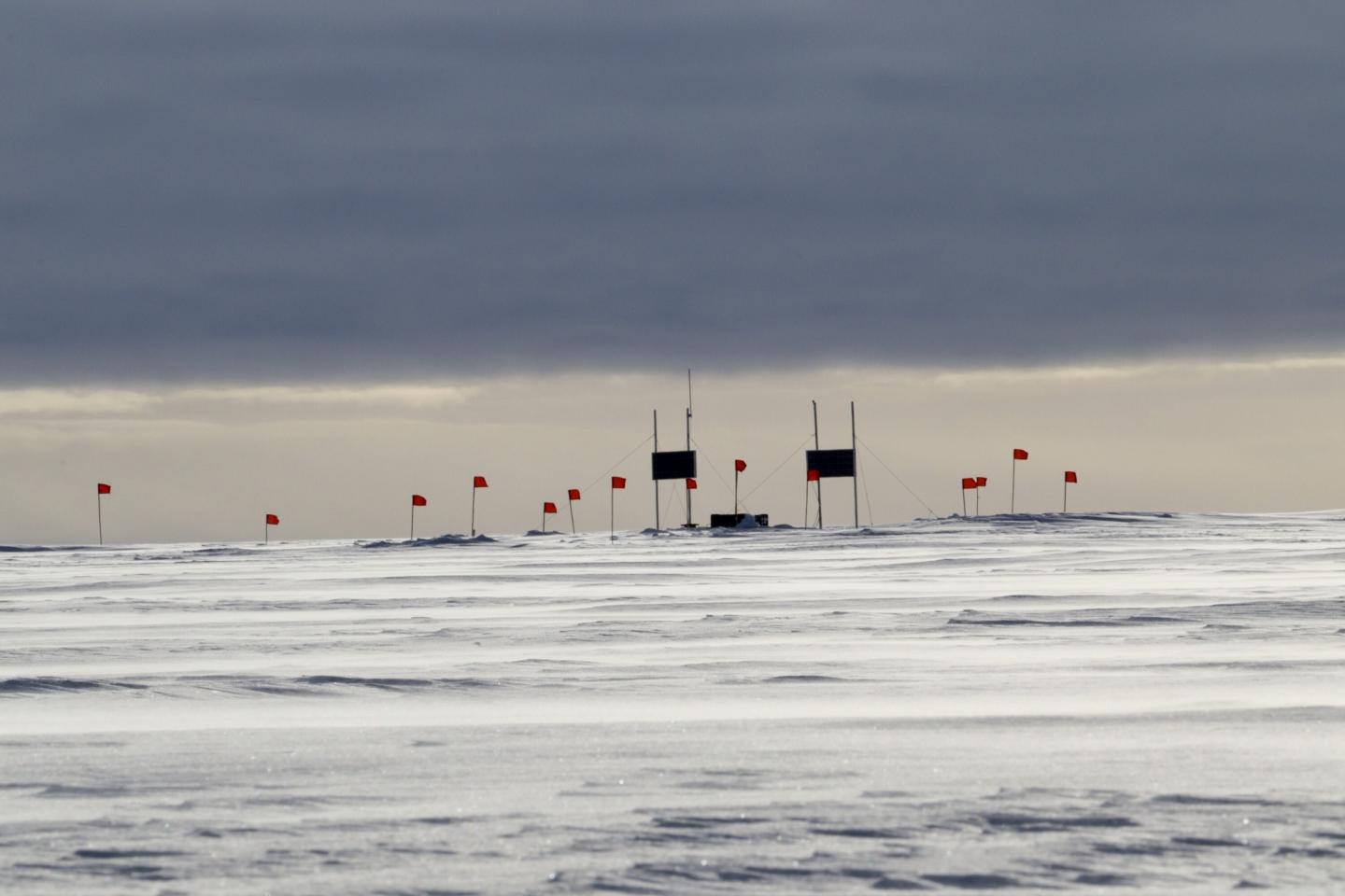 Chasing cosmic particles with radio antennas in Greenland's ice