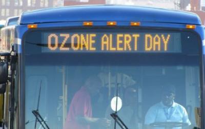 Bus with Text Ozone Alert Day on Display