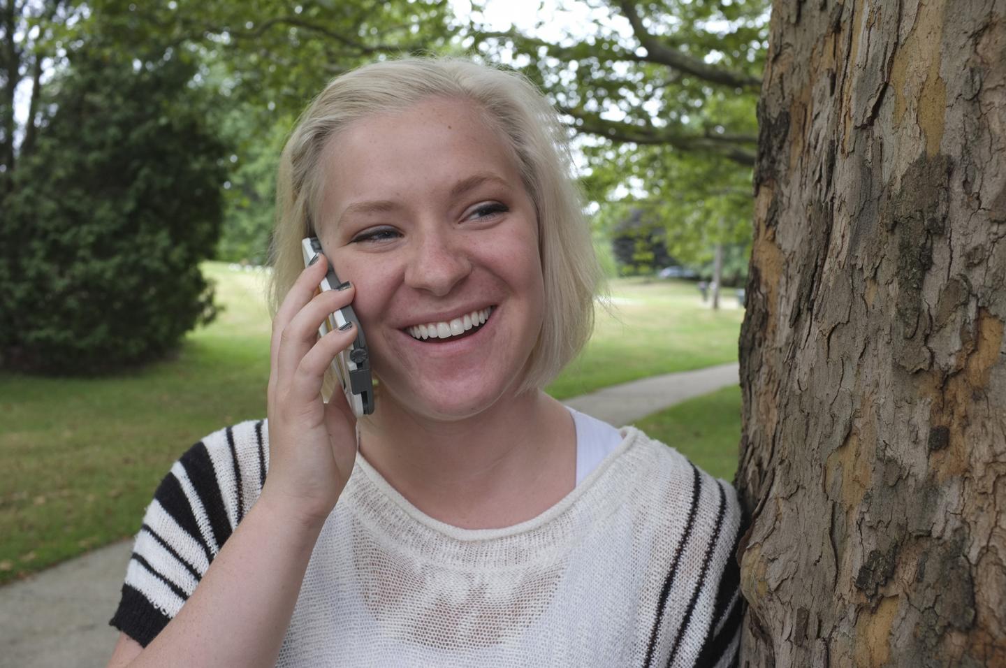 Kent State University Student Talks with Her Parents on Her Cell Phone