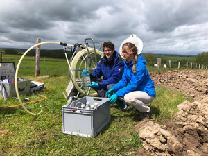 Authors in the field taking samples