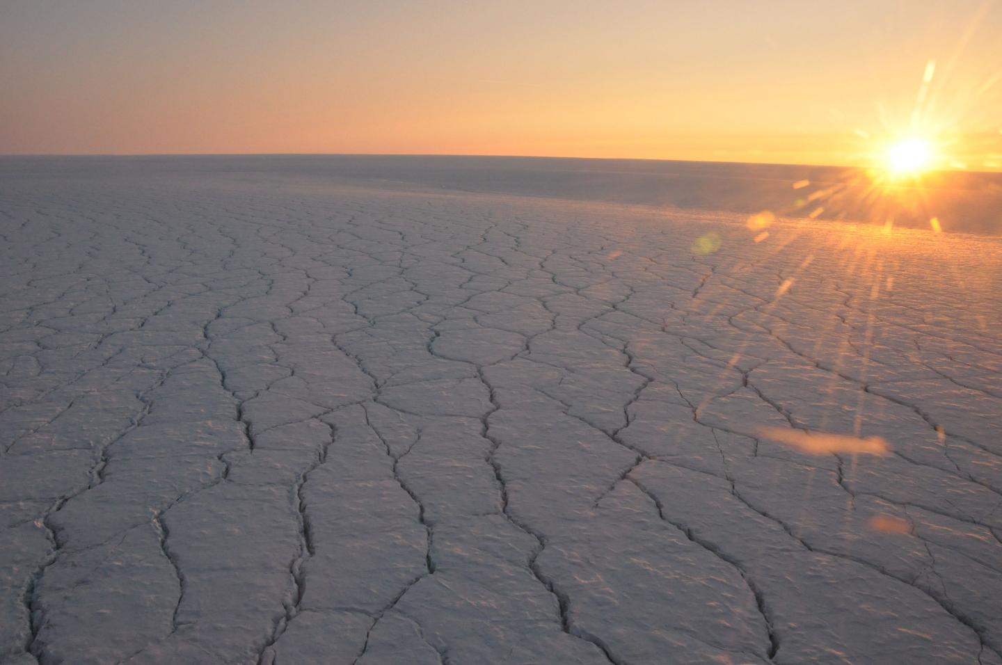 Clouds Enhance Greenland Ice Sheet Meltwater Runoff