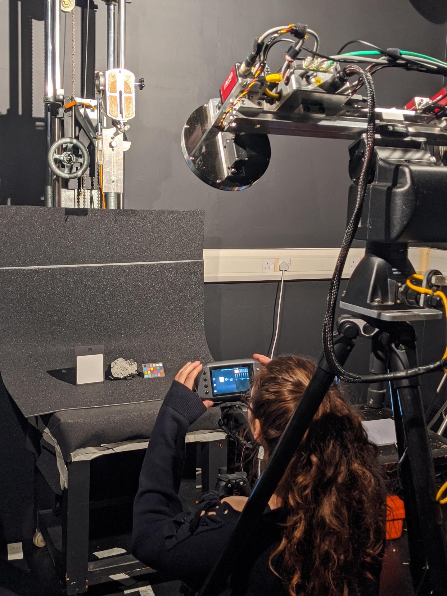 Sara Motaghian photographing the Martian meteorite Tissint