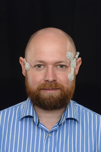 Researcher John Phillips Wearing the CAVA Device