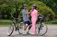Couple Prepares for a Bike Ride