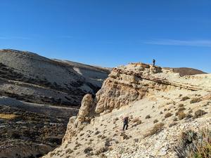 Researchers visit the Laguna del Hunco fossil site