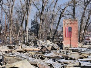 A lone chimney remains after the fire