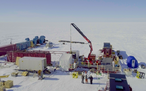 Sampling sediment from the lake at the bottom of the world