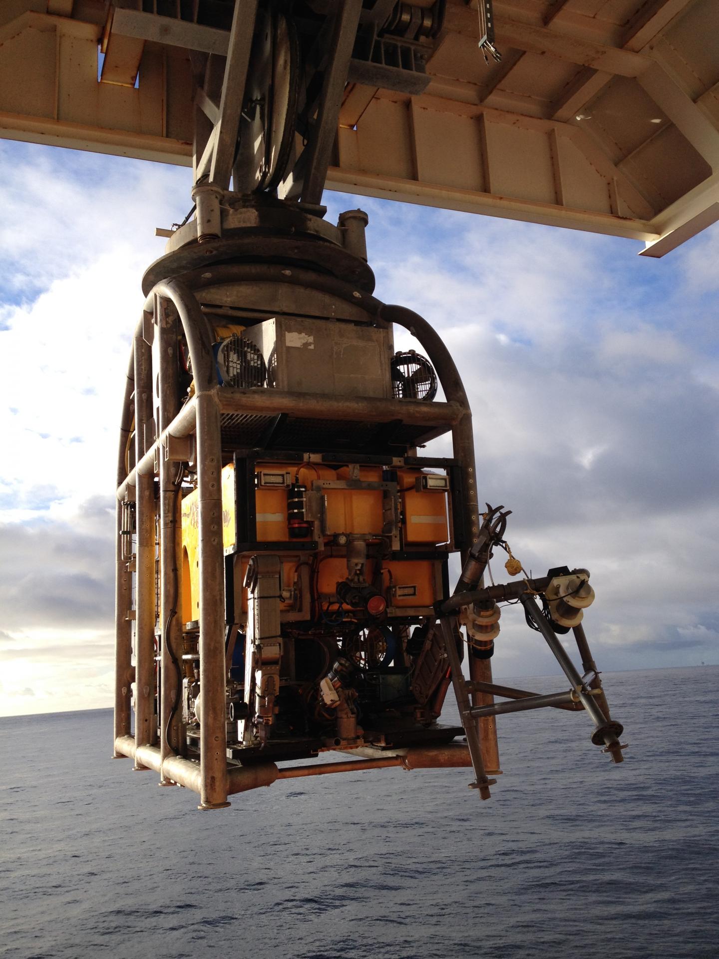 An Oceaneering Magnum ROV holding a time-lapse camera system