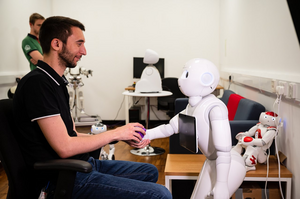 Living and working with smart robots